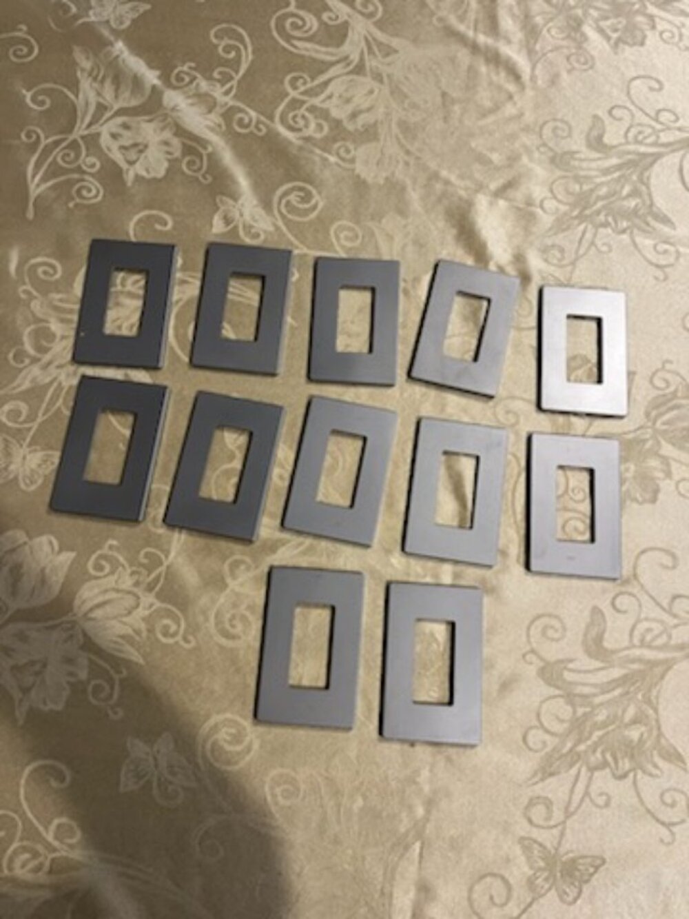 Decorative switch plates and outlet covers
